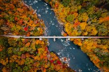 Aerial view of the Ohiopyle High Bridge in Ohiopyle, a charming borough in the Laurel Highlands of Southwestern Pennsylvania.