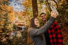 Gina Aiello and David Rahaman take a selfie at Frank Lloyd Wright's Fallingwater, just outside of Ohiopyle, a charming borough in the Laurel Highlands of Southwestern Pennsylvania.