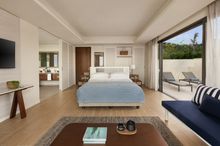 Suites feature a king bedroom with a separate living space and a generously sized terrace.