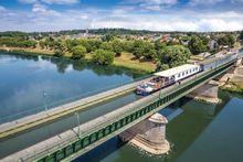 Hotel barge Renaissance crossing the Briare Aqueduct