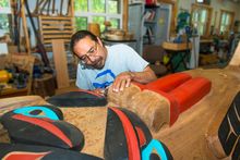 Master carver Keith Wolfe Smarch in the carving shed, Carcross