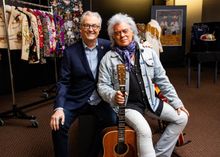 Kyle Young, CEO of the Country Music Hall of Fame and Museum, and Marty Stuart, pictured in the museum's archives with a selection of artifacts from the Marty Stuart Collection.