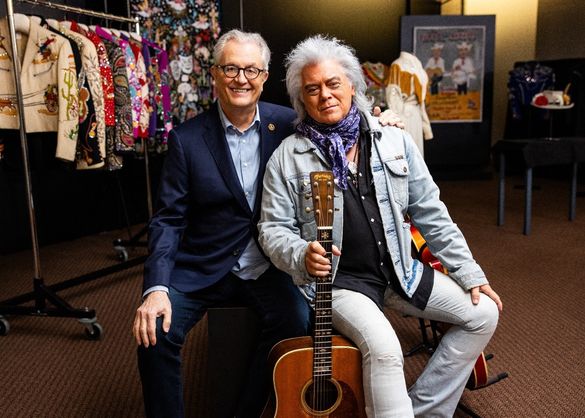 Kyle Young, CEO of the Country Music Hall of Fame and Museum, and Marty Stuart, pictured in the museum's archives with a selection of artifacts from the Marty Stuart Collection.