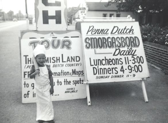 Managing Partner, Dan Strauss, as a young boy outside of Miller's. He had just been rolling pie crust.