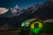 Kyangjuma camp at night with Ama Dablam in the distance