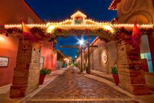 Holiday lights shine along Aviles Street - the oldest street in the oldest city. 