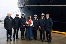 Godmother Marianne Sivertsen Næss together with (from left) founder and chairman Per Sævik, chief mate Johnny Jensen, hotel manager Judith Hydle, captain Joakim Albrigtsen, chief engineer Torleif Bjørknes and managing director Bent Martini.