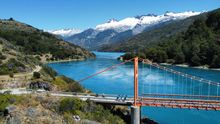 Cycling General Carrera Lake hanging bridge & northern Ice fields in the back