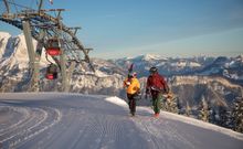 A couple on their way to their first descent of the day. 