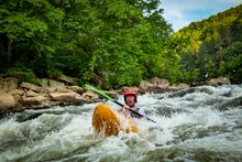 A kayaker splashes through the Youghiogheny River in Pennsylvania's Laurel Highlands.