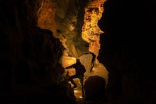 A spelunker explores the depths of Laurel Caverns in Pennsylvania's Laurel Highlands region.