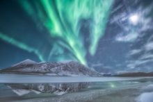 Reflection of northern lights on Nares Lake, Carcross, Yukon