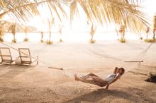 Relax in Maldivian style in hammocks all around Kandooma.