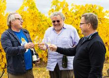 Sean O'Keefe, Larry Mawby, and Eddie O'Keefe Jr., toast 50 years of winemaking in Traverse City