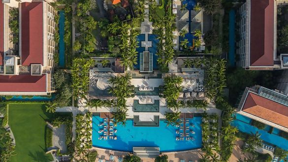 A breathtaking perspective of Mulia Bali, where lush greenery meets luxurious serenity—an oasis of sustainability and elegance in the heart of Nusa Dua