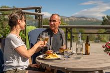 Two people enjoying lunch outdoors