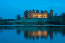 Linlithgow Palace and St Michael's Parish Church by Linlithgow Loch