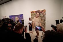 Archibald Prize 2024 winner Laura Jones with her work 'Tim Winton' at the Archibald, Wynne and Sulman Prize announcement at the Art Gallery of New South Wales