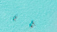 The Ritz-Carlton Maldives, Fari Islands_Family canoeing