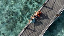 Sheraton Maldives Full Moon Resort & Spa - Family on a bridge