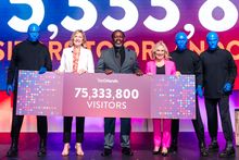 Visit Orlando Board Chair Barb Bowden, Visit Orlando President & CEO Casandra Matej, Orange County Mayor Jerry Demings and the Blue Man Group, who performed during Visit Orlando’s Signature Luncheon during National Travel & Tourism Week. 