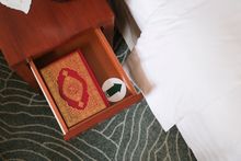 Each room is equipped with a Qibla directional sign to maintain guests in their daily spiritual practices.
