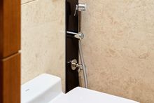 Bathroom is equipped with Bidets