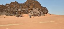 A traveller on an e-bike navigates the Jordan Trail