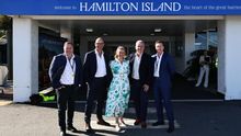 Queensland Tourism Minister Andrew Powell, North Queensland Airports chief executive Richard Barker, assistant tourism minister Bree James, East air owner Alan Milne and Hamilton Island chief executive Nick Dowling celebrate the launch of the new service 