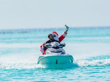 Sheraton Maldives Full Moon Resort & Spa - Santa's Jet Ski Arrival