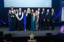 Linda Johnson and Vernon Kay with The George Inn team