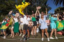 Spectators on Genesis Island celebrate at the 2024 KPMG Australia Sail Grand Prix in Sydney, Australia.