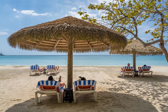 Relaxing on the beach at Sunset at the Palms in Negril, Jamaica.