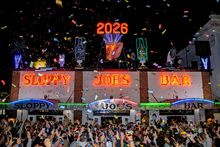 Confetti rains down on thousands of revelers during the 32nd annual Conch Shell Drop at Sloppy Joe's Bar, Thursday, Jan. 1, 2026, in Key West, Fla. The giant conch shell — a celebrated symbol of the Florida Keys — descended to the bar's rooftop at midnigh