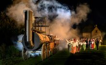 And even a full-scale replica of Locomotion No. 1 roars across the 7.5 acre stage