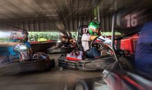High-speed go-kart racing at Octane Raceway. 