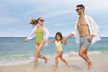 The Westin Maldives Miriandhoo Resort_Family Running on the Beach
