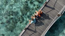Sheraton Maldives Full Moon Resort & Spa - Family on Overwater Bridge