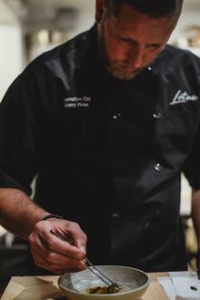 Chef Barry Honan's Chef Honan’s approach as a chef-storyteller has earned him a reputation for excellence. In 2026 Honan was nominated as BEst Chef in teh South for a James Beard Foundation Award, and his restaurant, Lotus Noodle Bar has been recognized i