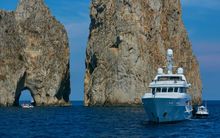 Luxury yacht at Capri's cliffs