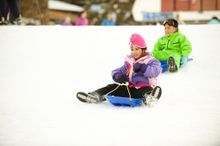 Toboganning on Mount Buller