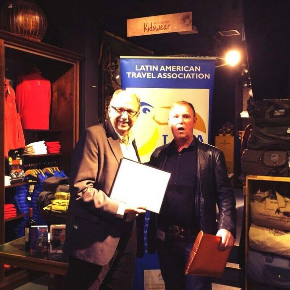 LATA Chairman Chris Pickard with surprised award winner of consumer newspaper category, Chris Haslam for The Sunday Times