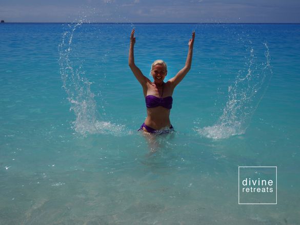 A happy yogini on Porto Katsiki beach, Lefkada