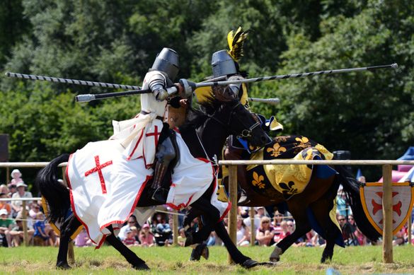 Skilled Knights do battle at speed on horseback 