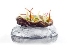 Highly mineral Ancelin Oyster with fresh  White Asparagus Jus, Apple Blossom & Celery