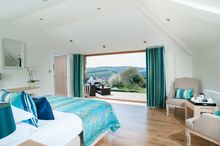 One of six new gorgeous rooms unveiled at The Horn of Plenty country house hotel