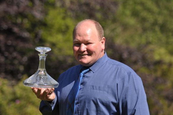 Jody Marshall, Ballathie general manager holding the CIS trophy