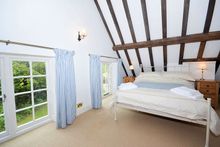 One of the enchanting bedrooms at The Old School House