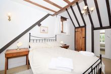 One of the enchanting bedrooms at The Old School House