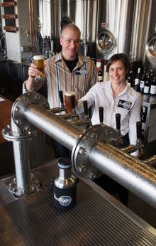 BentSpoke Owners Richard Watkins and Tracy Margrain celebrate the opening of BentSpoke Brewing Co